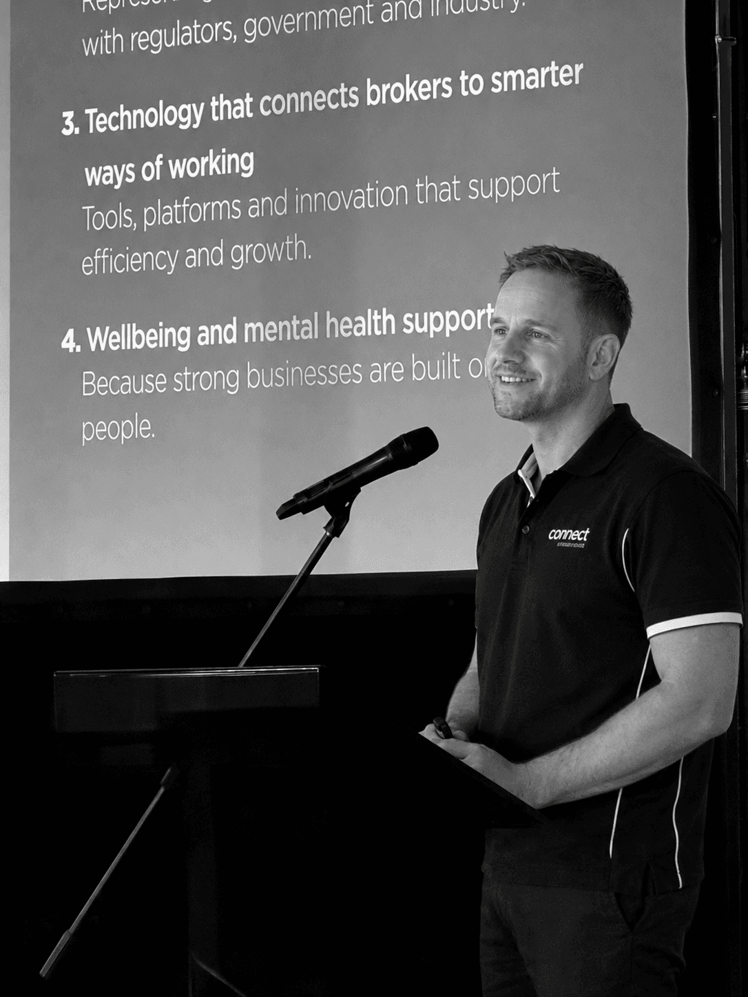 Finweb speaker presenting ideas about technology and broker support.